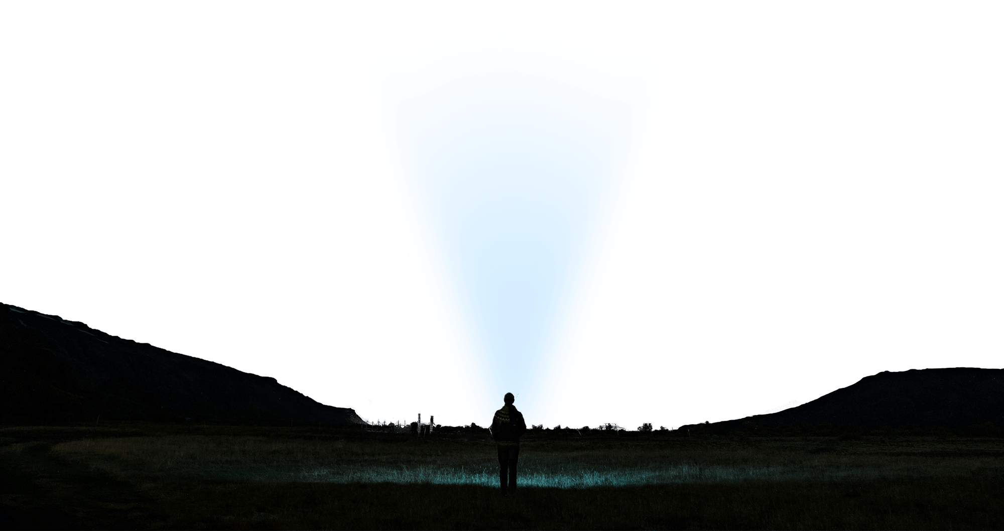 A man looking at the night sky