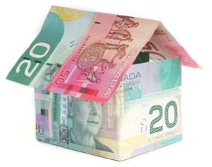 two twenty-dollar Canadian bills stacked in the shape of a house