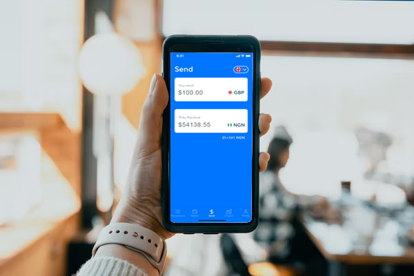 hand holding phone with Afriex app open