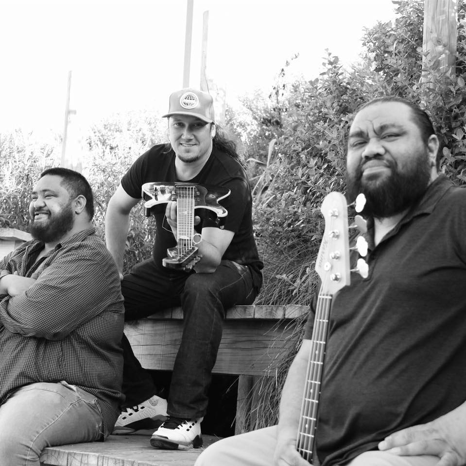 The D'sendantz sitting with instruments