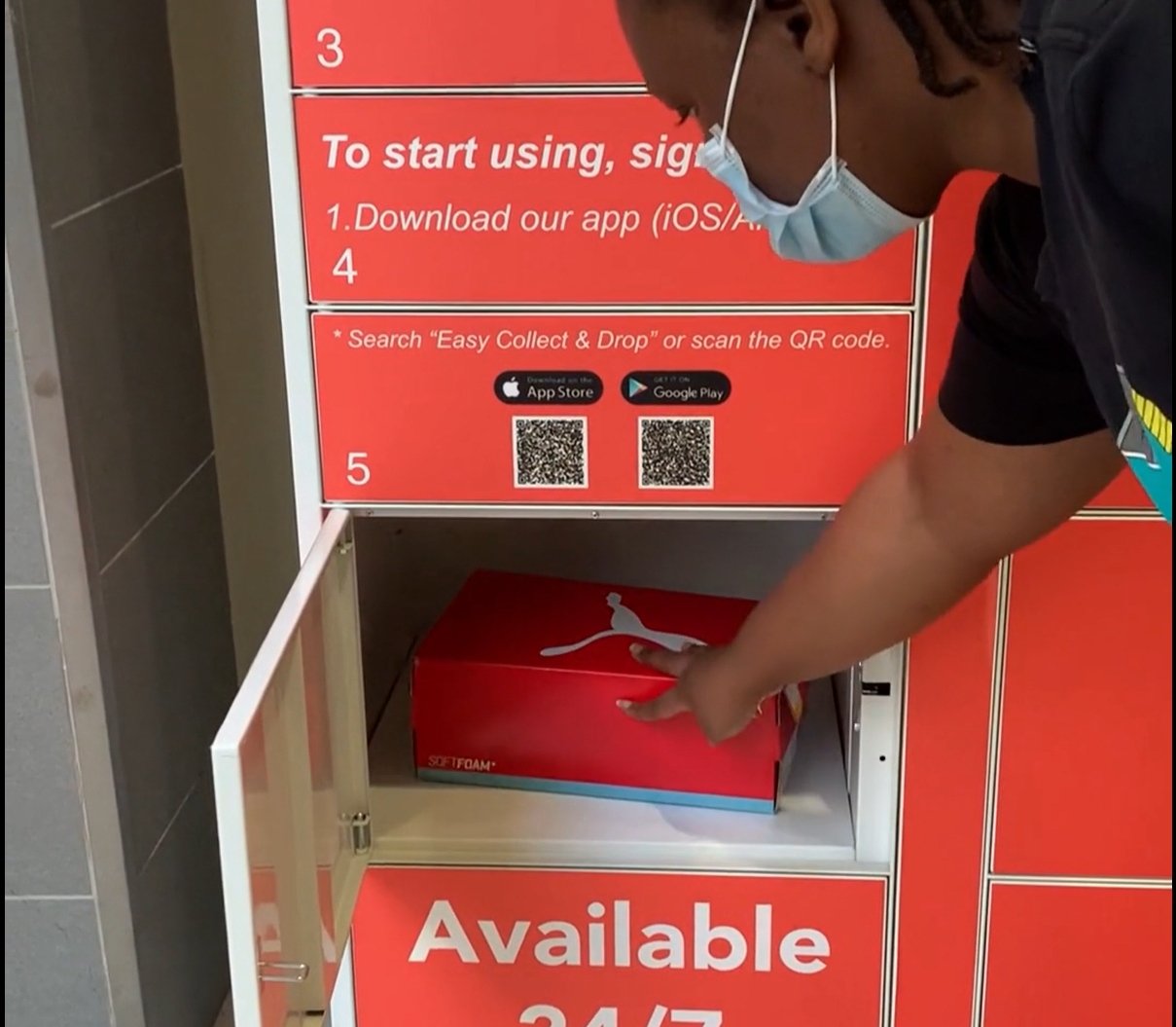 a woman using ECD locker