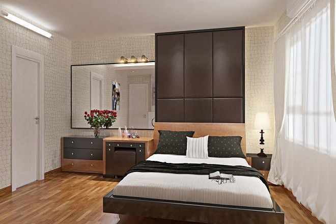 Căn phòng trở nên sinh động với giấy dán tường hoa văn nhẹ nhàng.