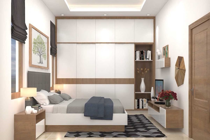 Thiết kế tủ quần áo cánh phẳng cao kịch trần cung cấp không gian lưu trữ thoải mái cho phòng ngủ của cậu con trai.