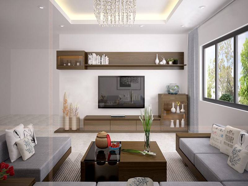 hình ảnh phòng khách nhà vườn với ghế sofa gỗ bọc nệm ghi xám, bàn trà gỗ - kính, tủ kệ tivi gắn tường, đèn chùm sang trọng