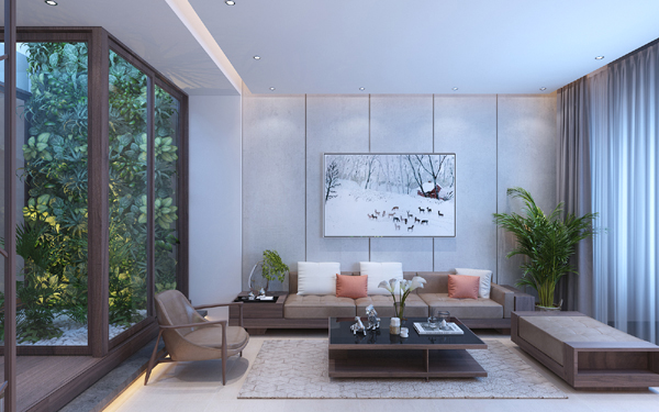 hình ảnh toàn cảnh phòng khách nhà lô phố với sofa ghi xám, gối tựa màu cam, bàn trà kính, ghế thư giãn, tranh treo tường, cửa kính mở ra tiểu cảnh giếng trời