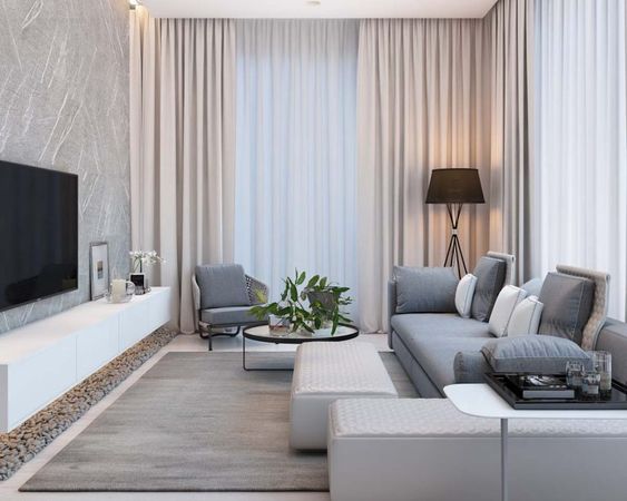 hình ảnh phòng khách biệt thự 2 tầng với sofa màu ghi xám, kệ tivi, rèm cửa 2 lớp, bàn trà kính hình tròn