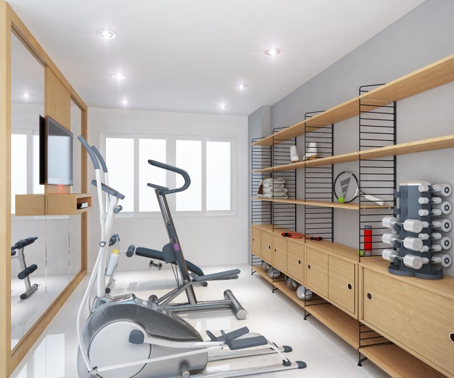 Phòng gym trang trí đơn giản với mảng kính lớn và TV giúp kéo dài hiệu quả tập luyện