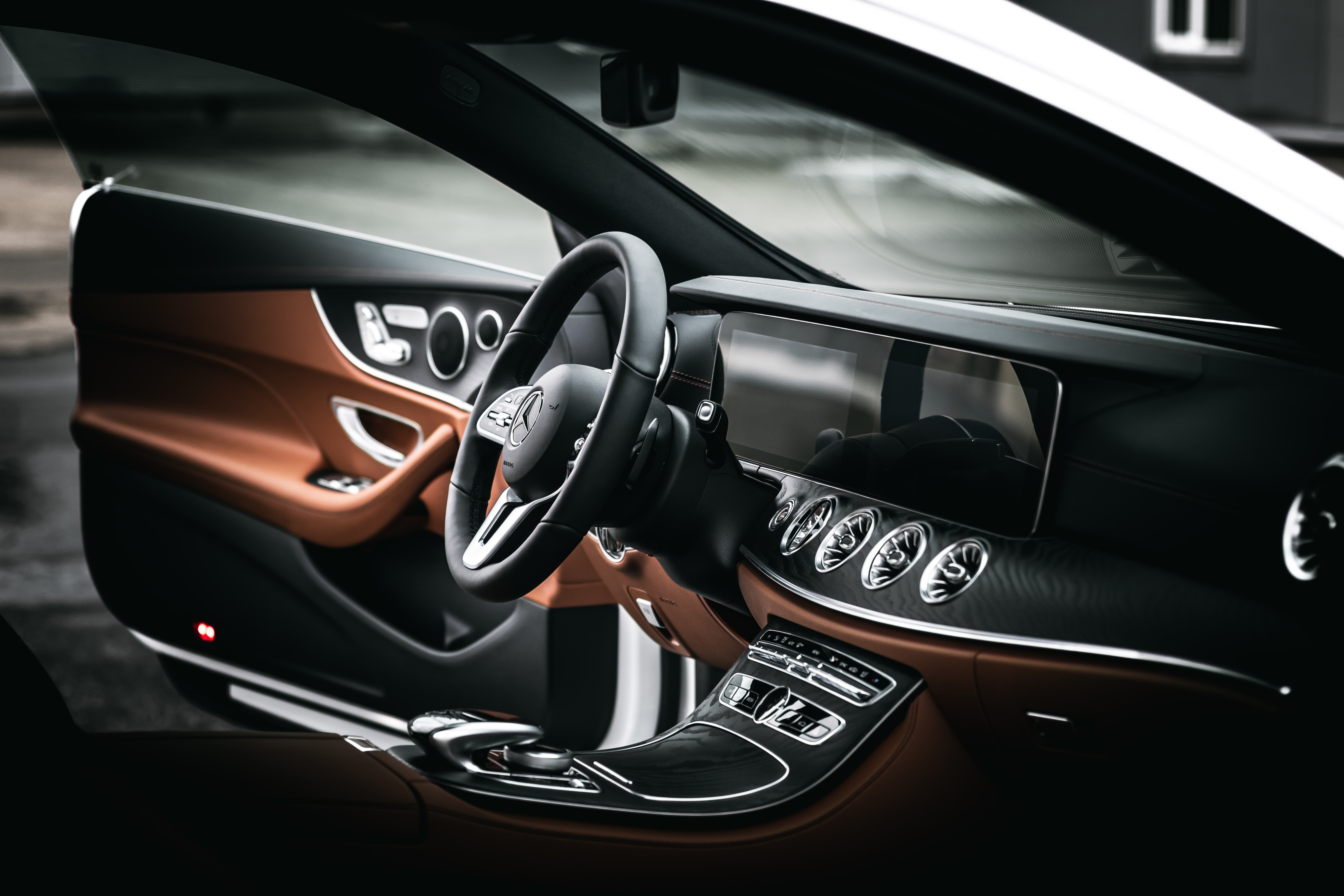 Inside a mercedes with black and tan interior