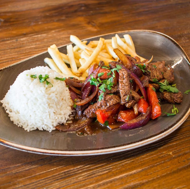 Our most popular dish, the Lomo Saltado can be made with Chicken, Shrimp, Ribeye, or Vegetarian. Pictured is the Lomo Saltado Ribeye.