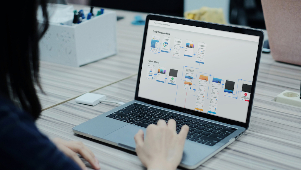 a flolab team member making a wireframe in computer
