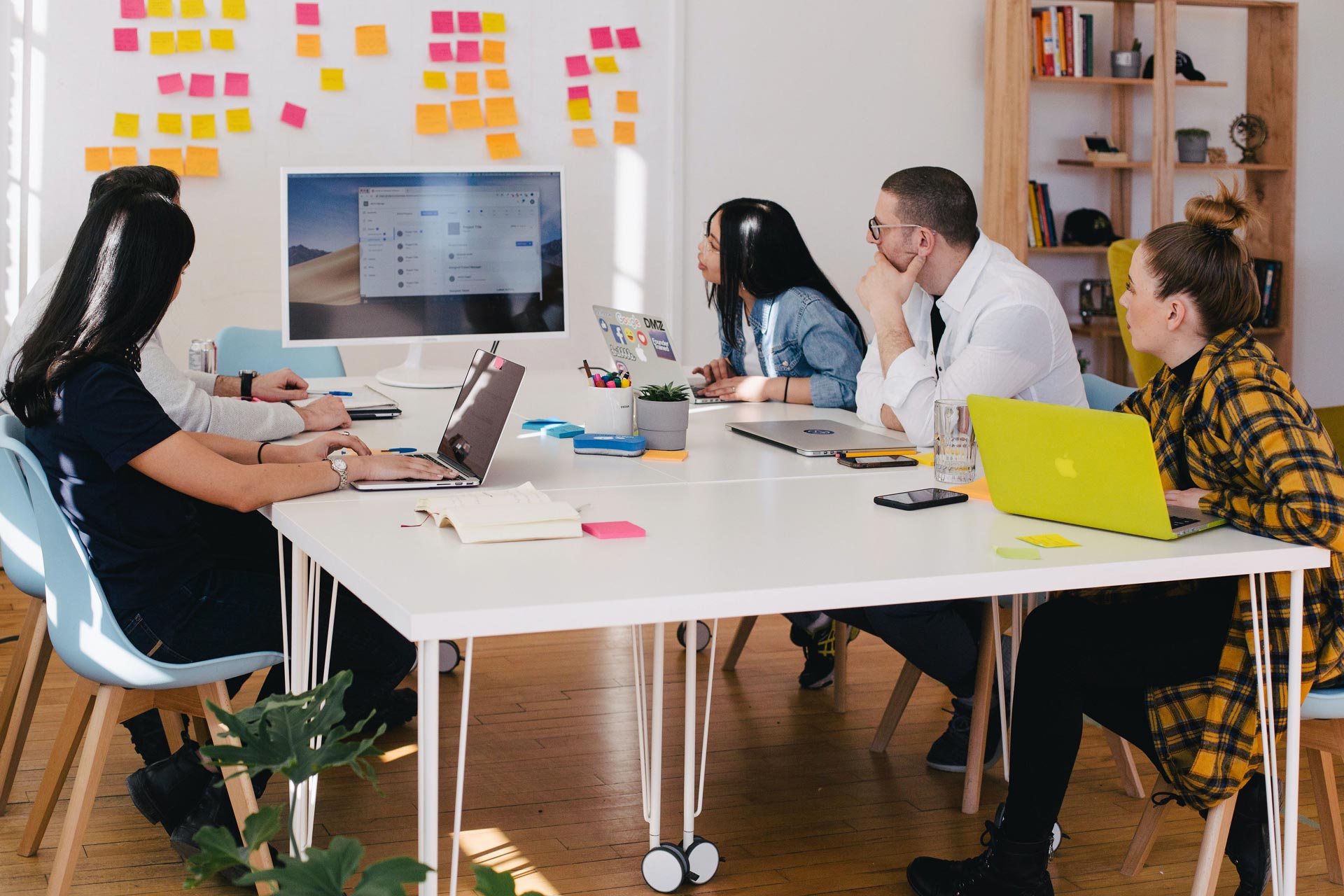 Team Working Around Desk