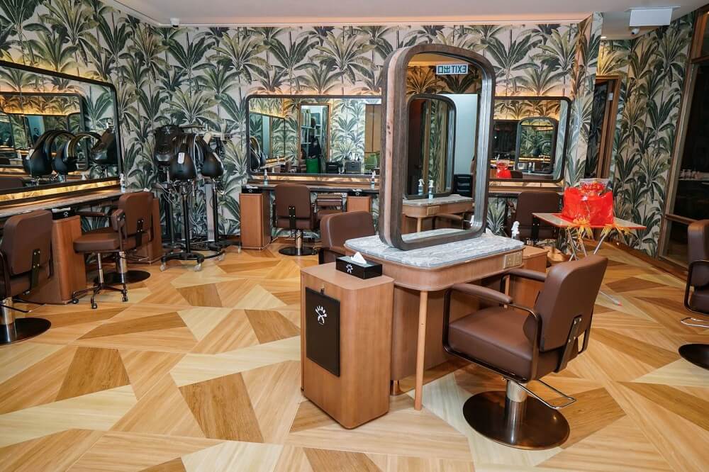 Interior of Saloon Festival Walk. Spacious with many sets of barber chairs.