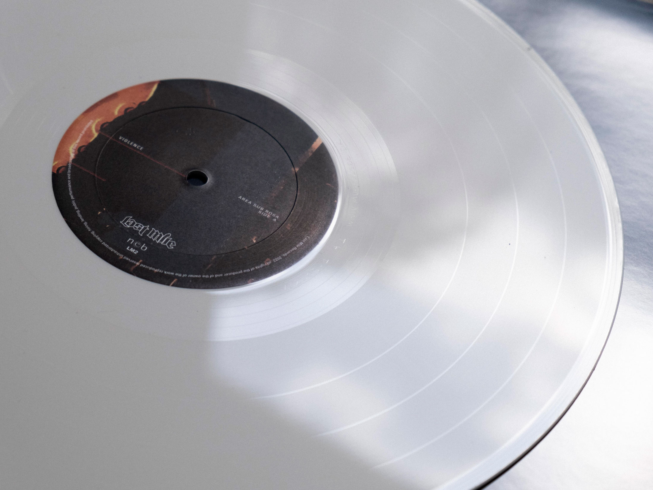 Closeup of 12" vinyl label design for Violence - Area Sub Rosa.