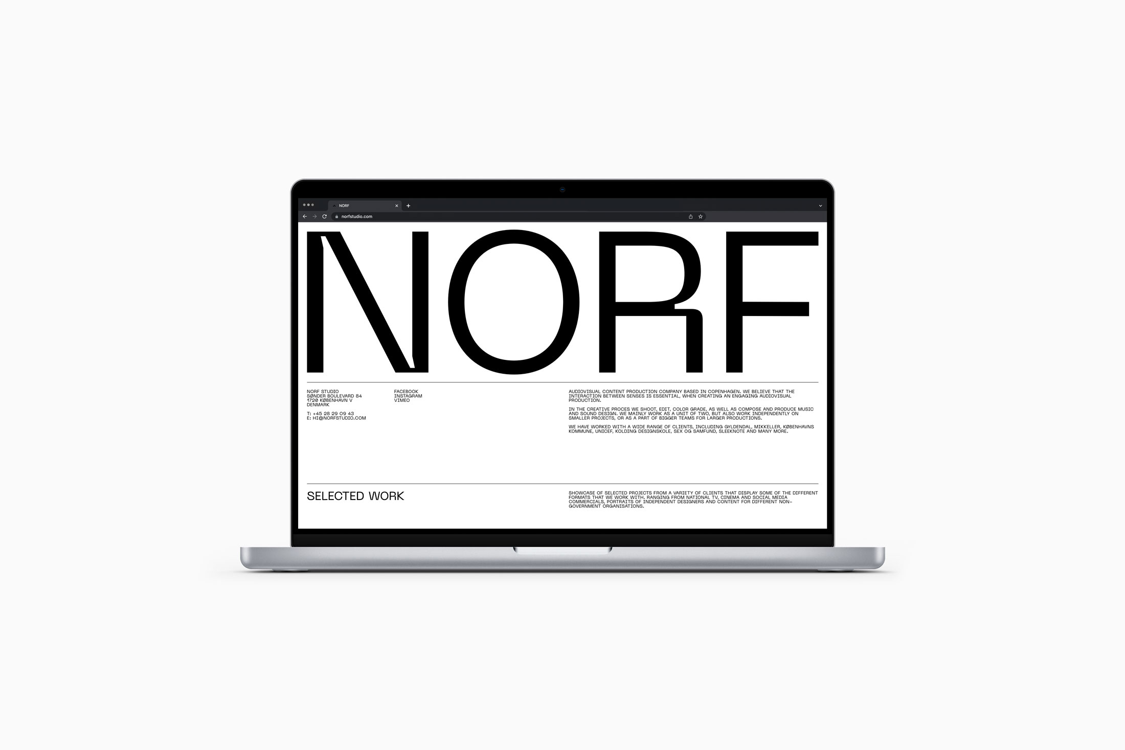 Mockup of NORF website shown on a MacBook Pro.