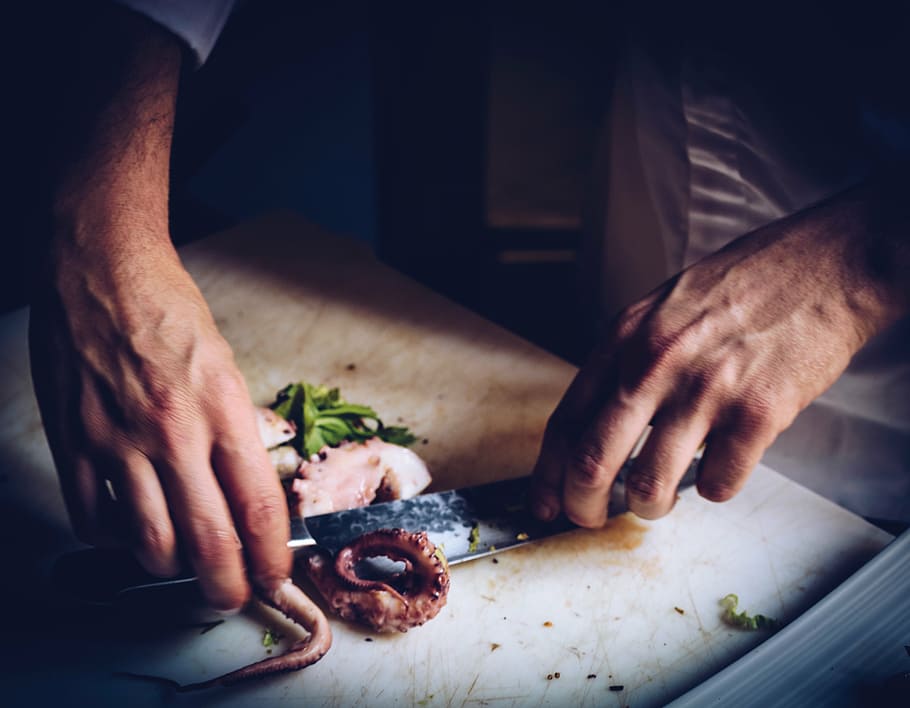 hands-cutting-cooking-knife