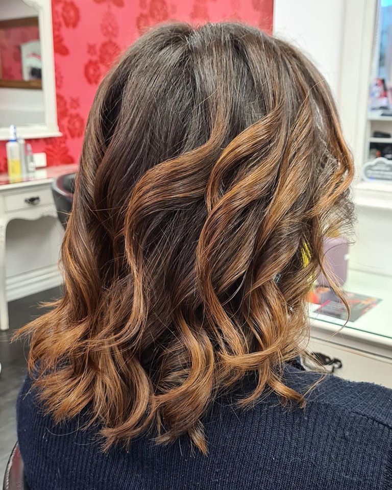 Brown curled hair after fixed
