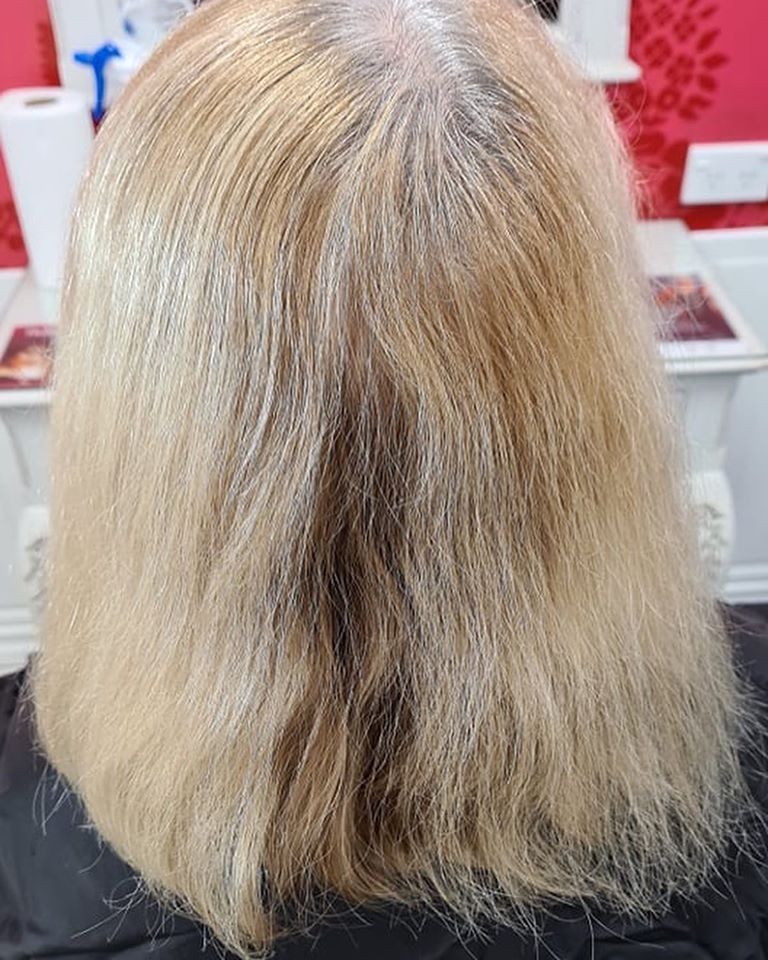 Damaged hair with grey roots