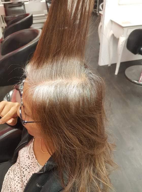 Damaged hair with grey roots
