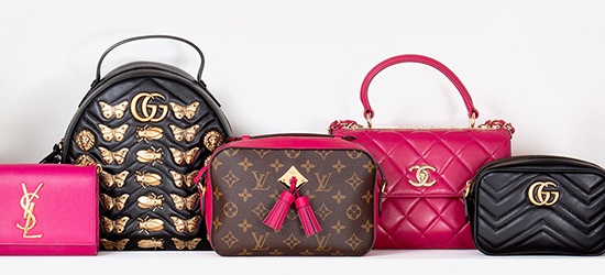 Handbags organized in color