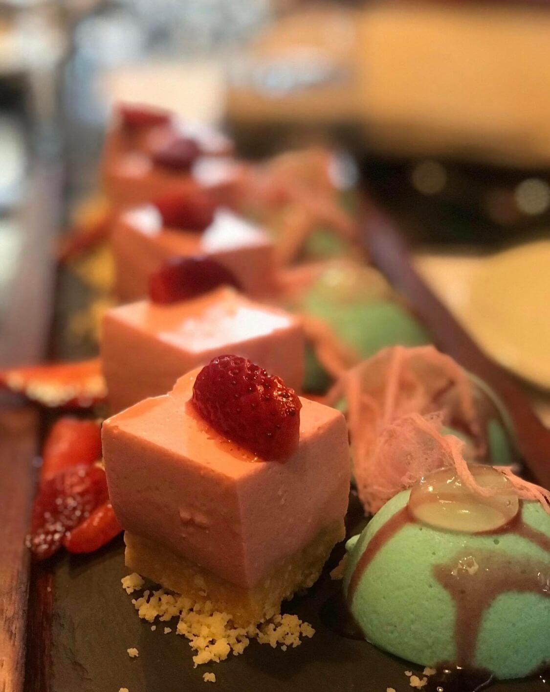 Strawberry Cheese cake with Blue Lagoon liqueur sorbet.