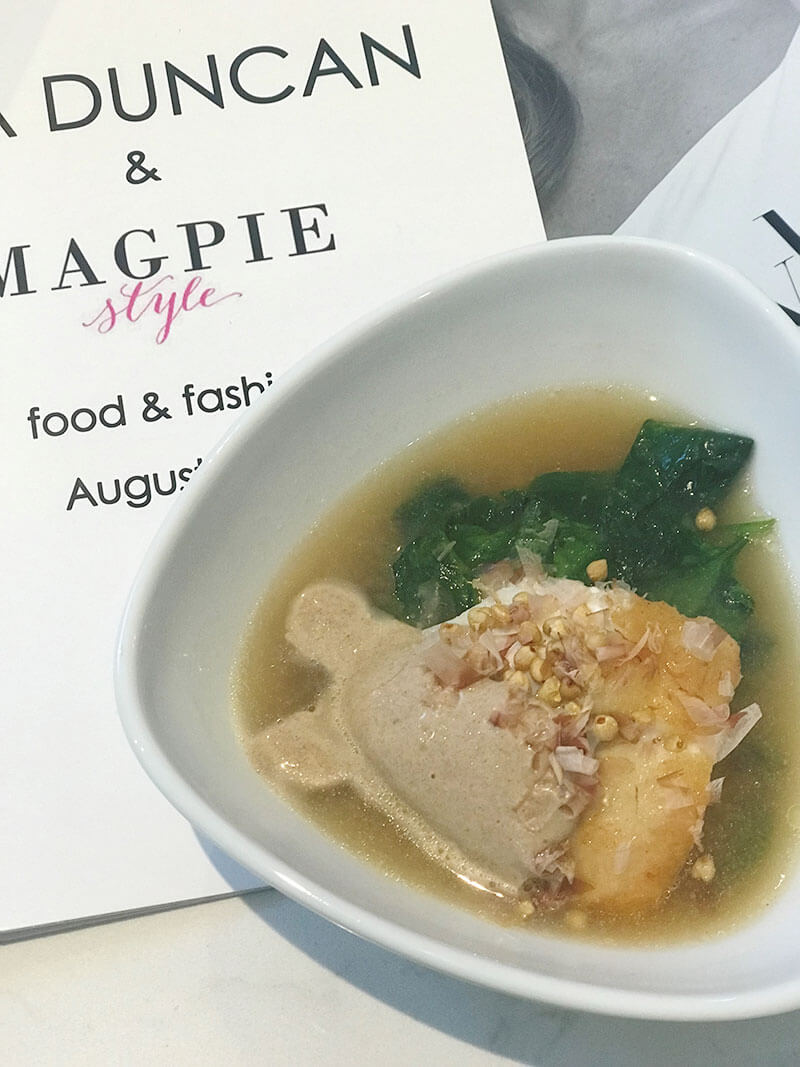 Miso hapuka broth, black garlic crema, toasted buckwheat.