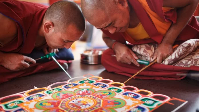 Monks making a sand mandala