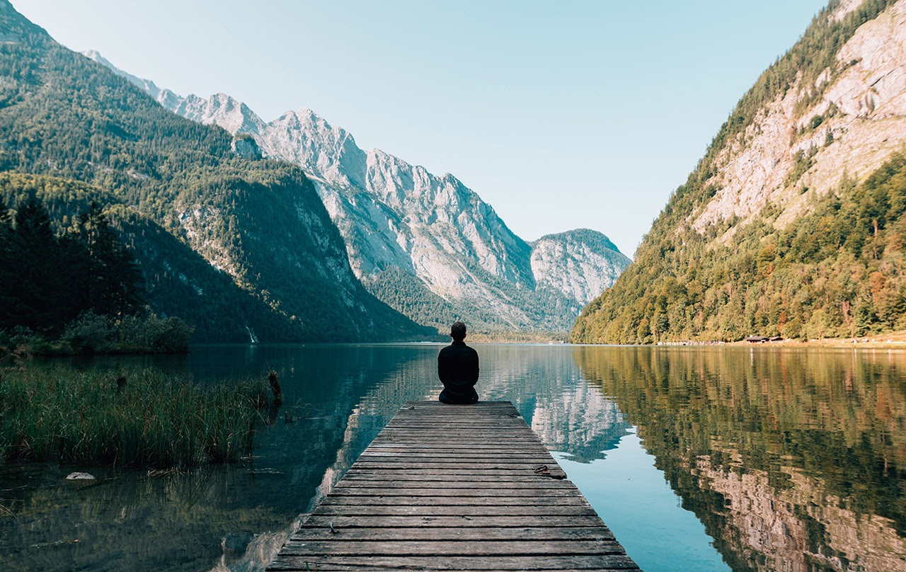 Man sitting on a dock