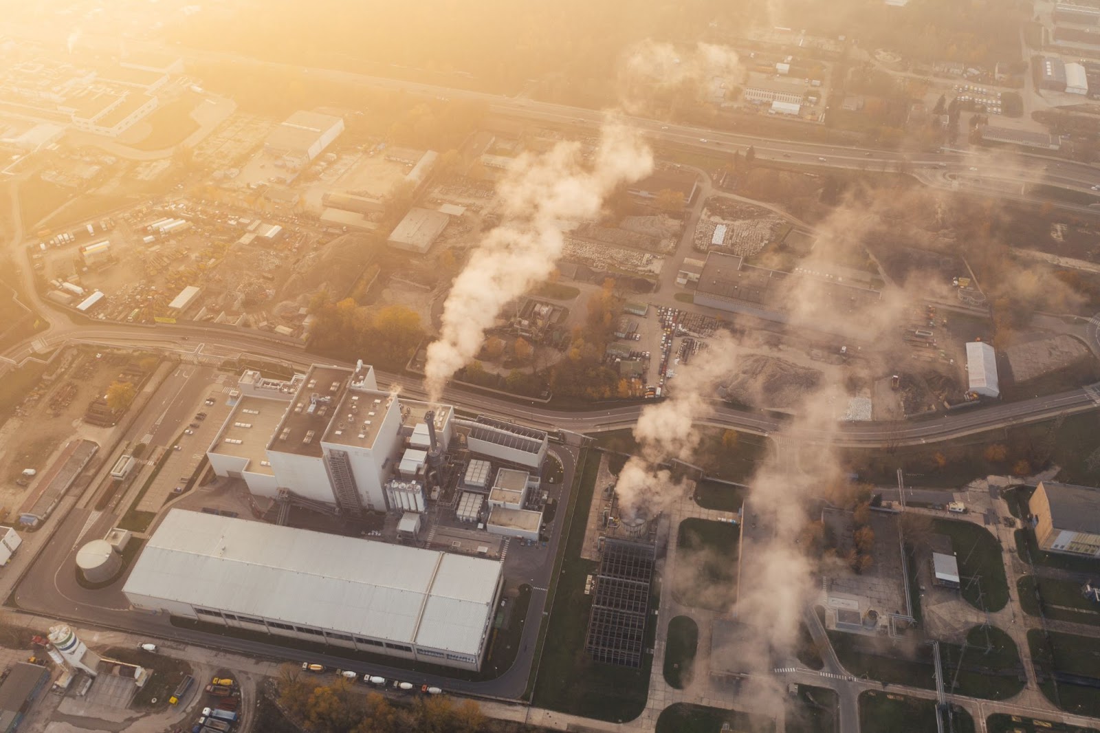 skyview of buildings polluting in gold and grey tones