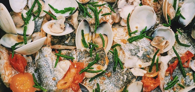 Cornish hake with wild samphire, vine tomatoes and clams