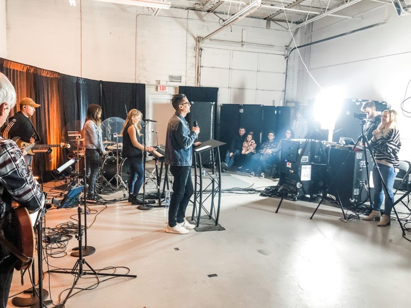 City Light Church pastor Jason Rollin, center, speaks as the production team livestreams a service from a warehouse in Rochester Hills, Michigan, Sunday, March 15, 2020. Photo courtesy of City Light Church