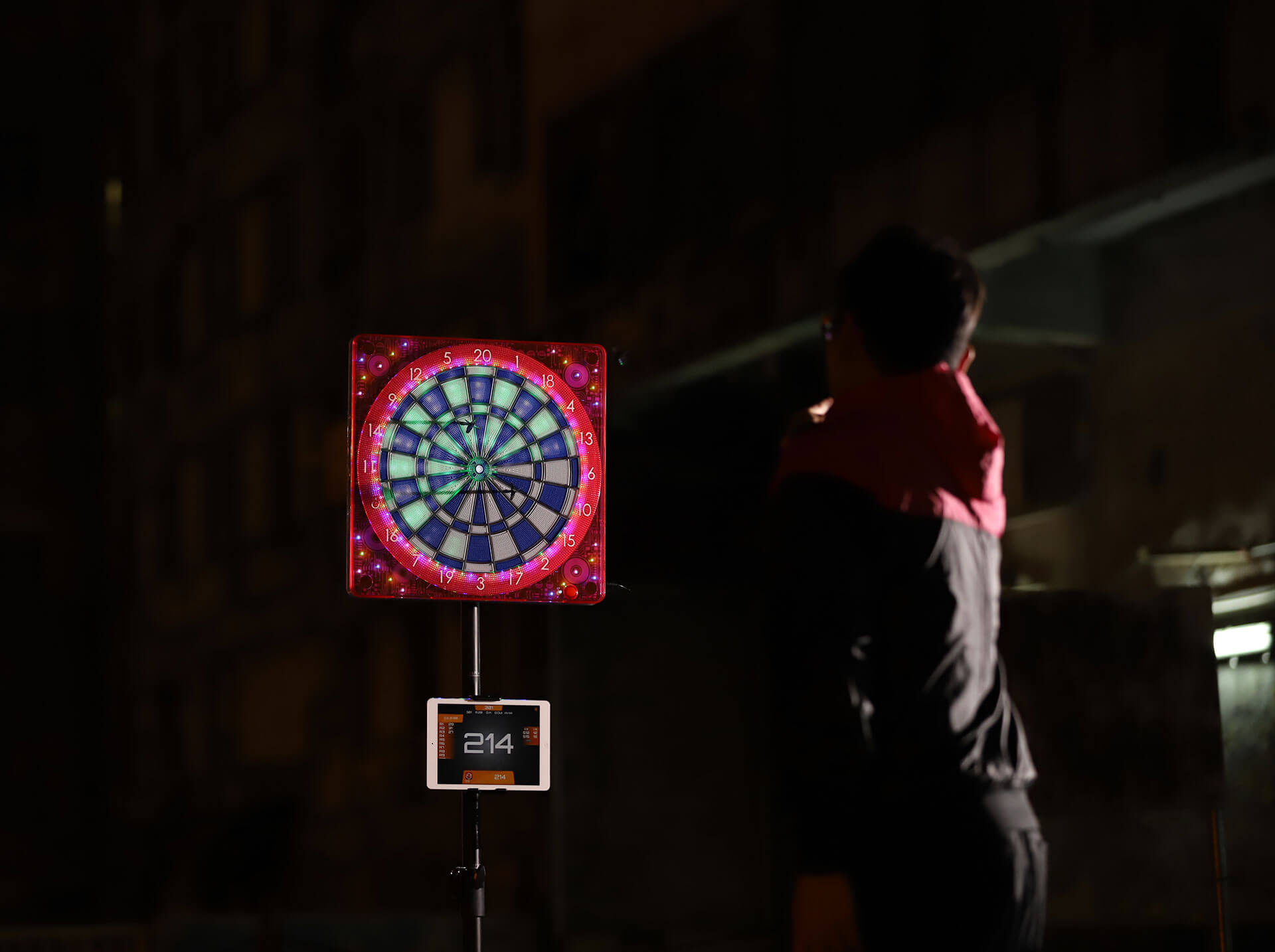 Darts player with The Darts Factory product