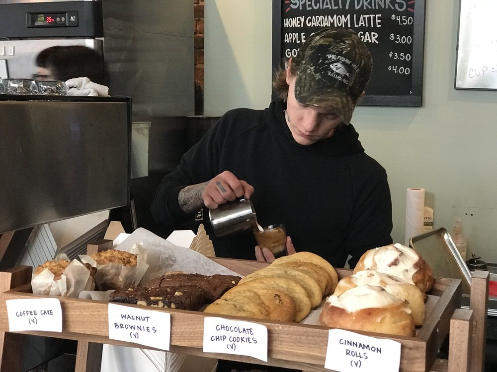 man making vegan coffee drink