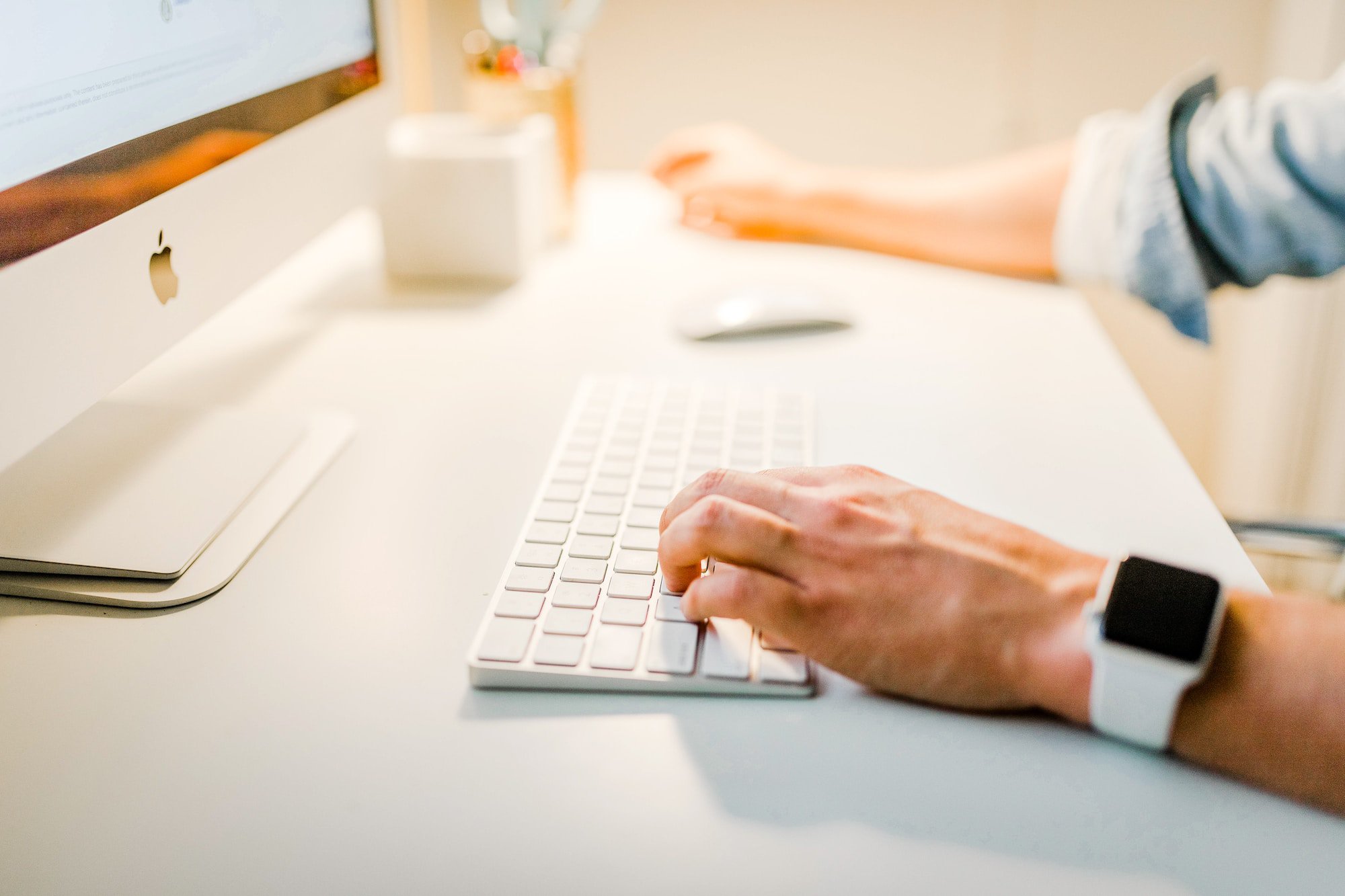 man at computer using a content management system