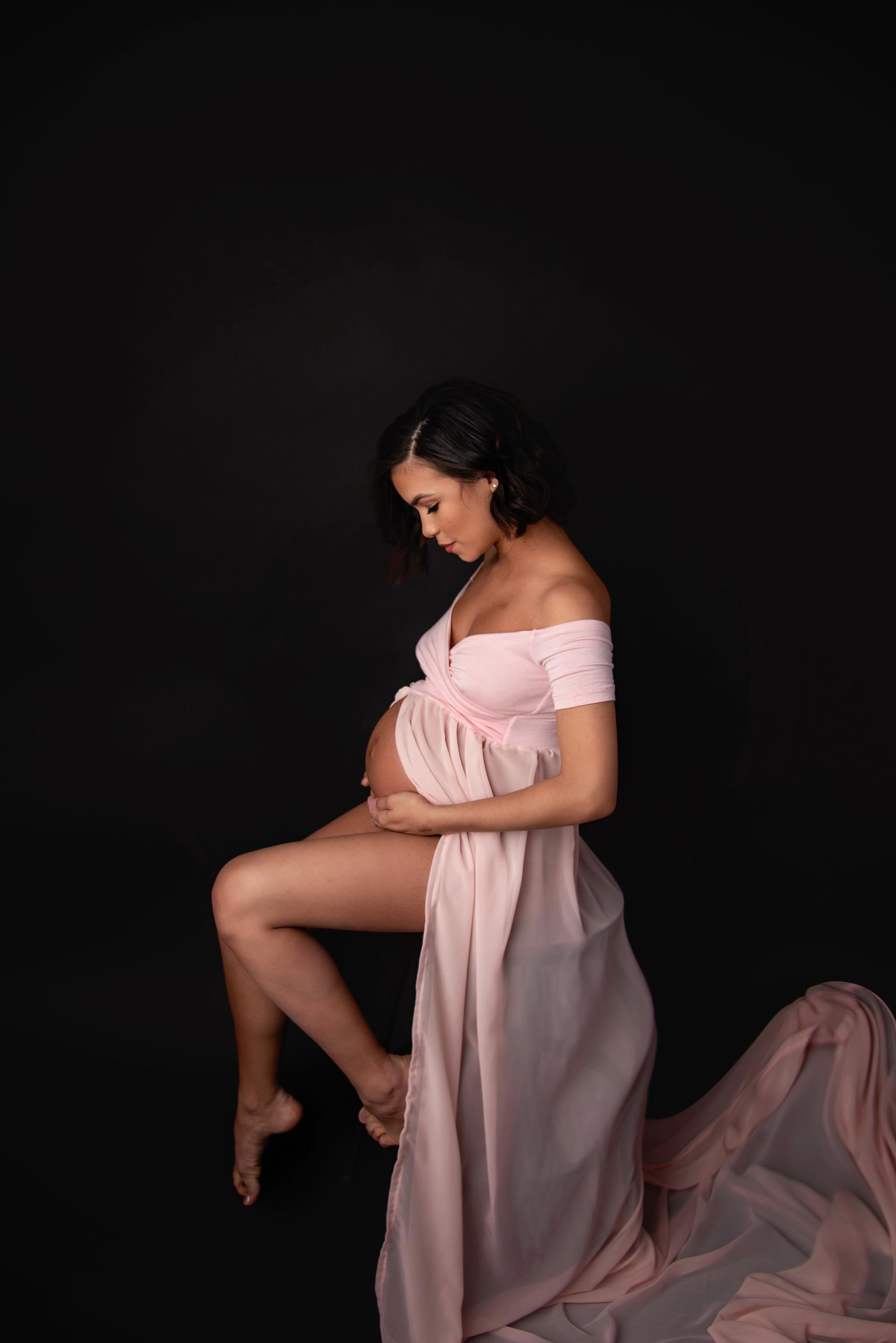 A pregnant mother during her colorado springs maternity photoshoot