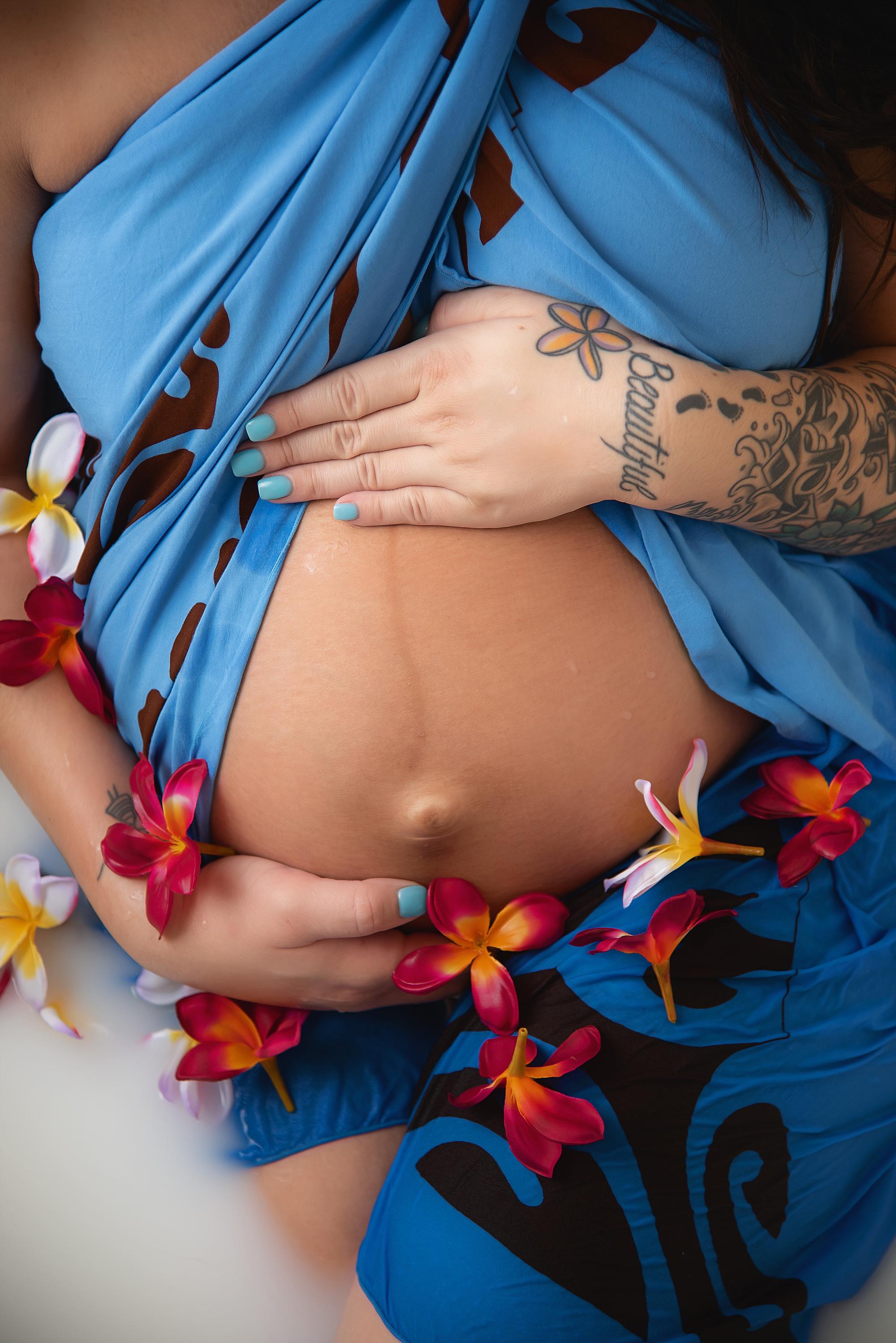 A maternity milk bath photoshoot