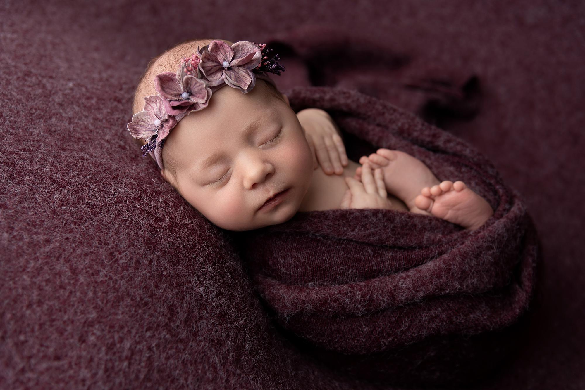 A sleeping newborn baby