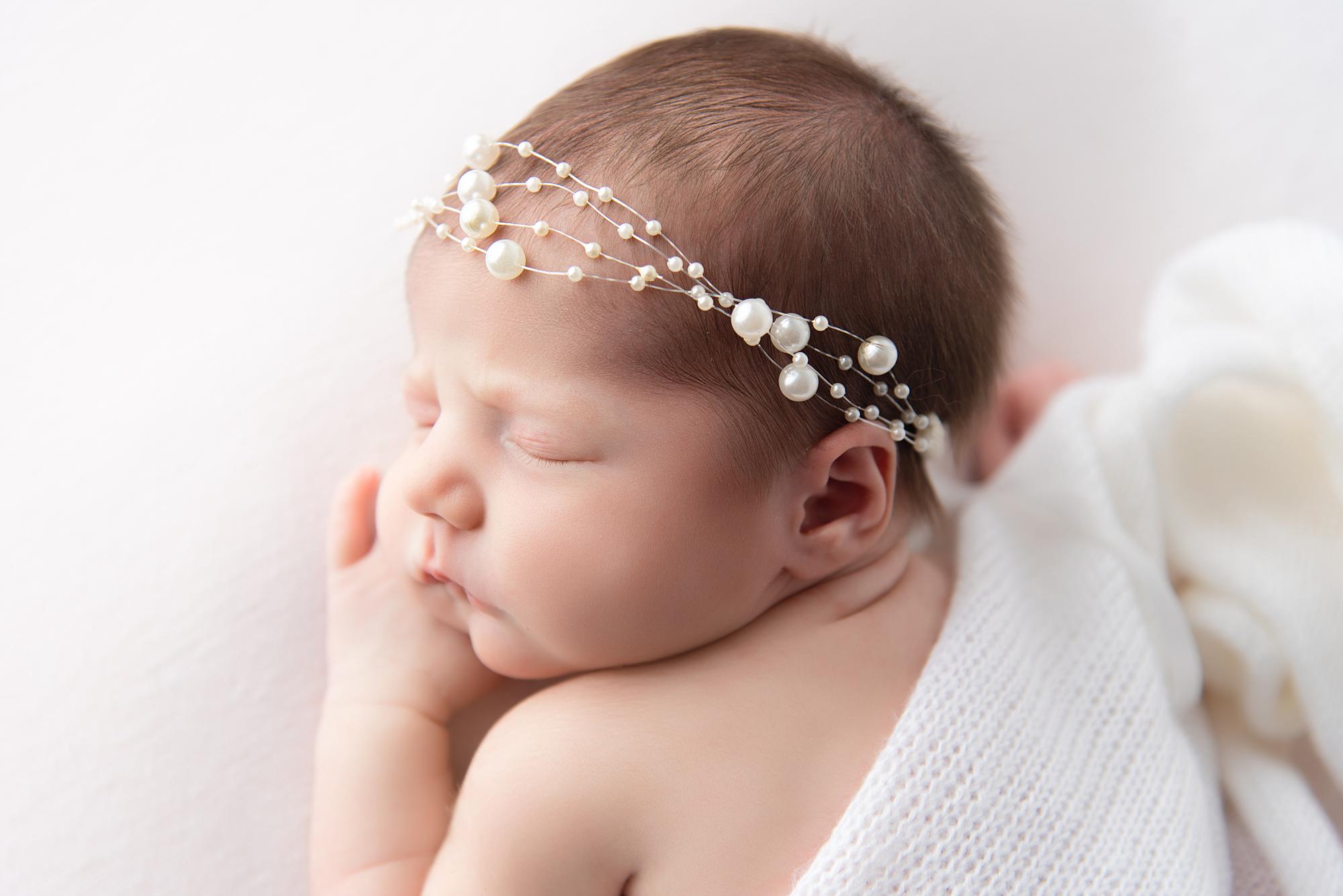 A sleeping newborn baby