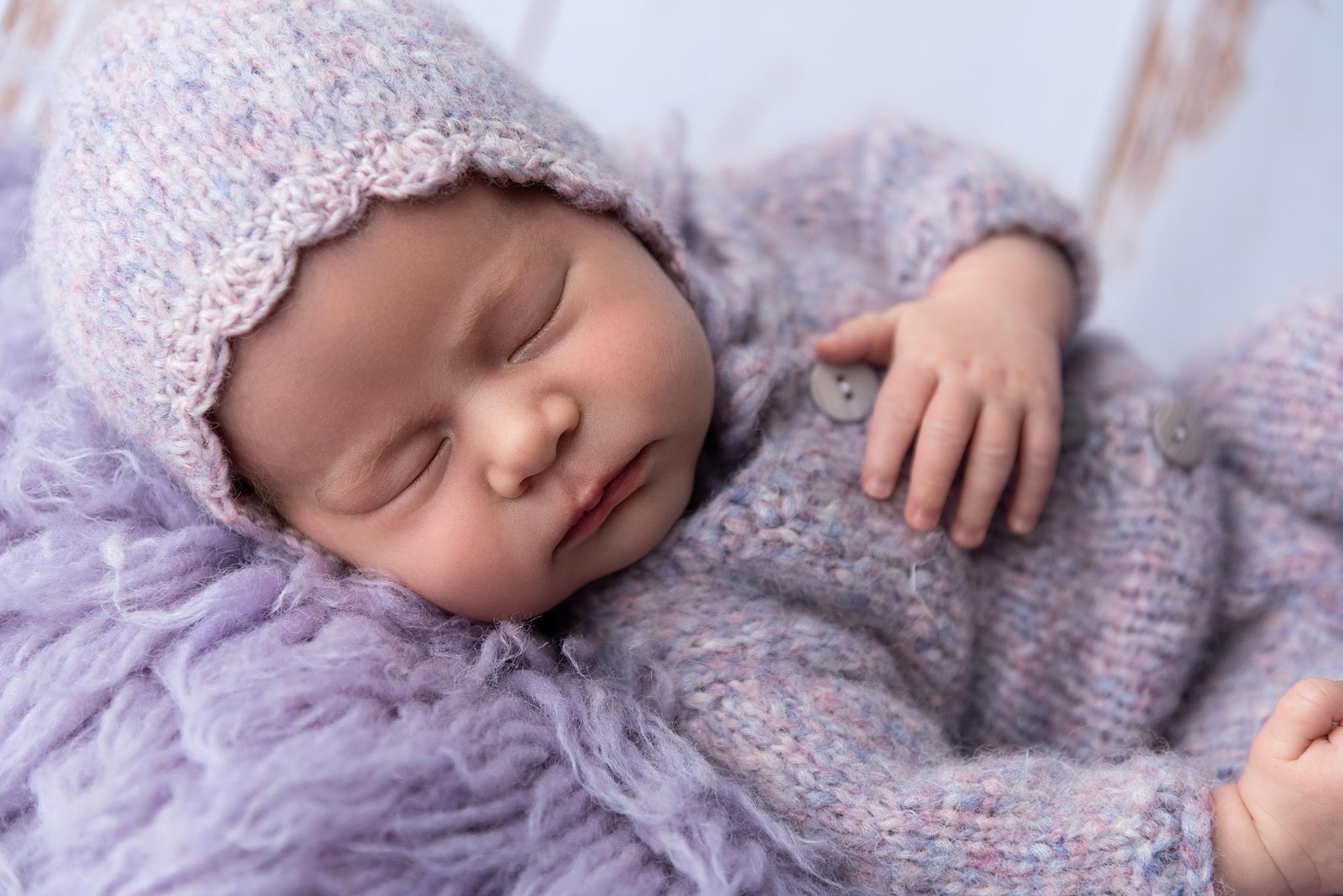 A sleeping newborn baby