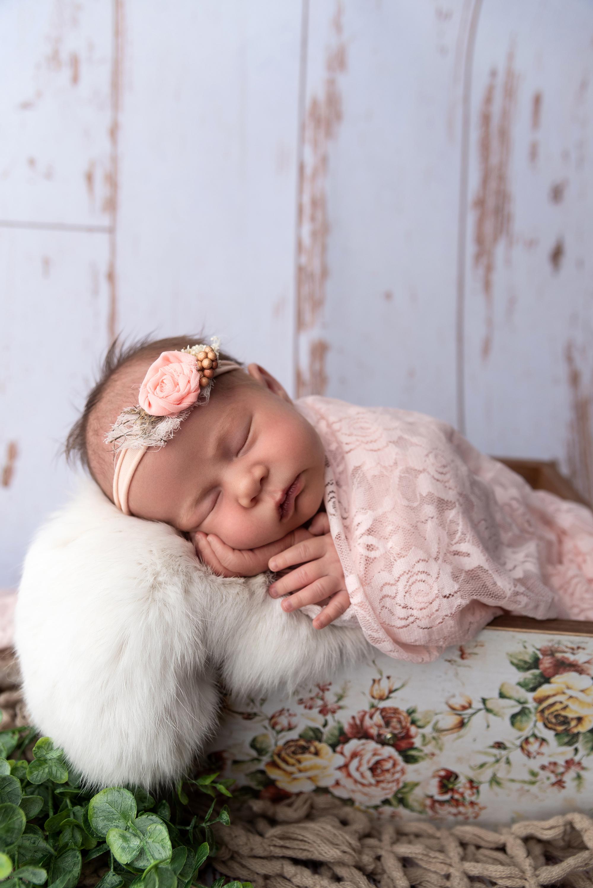 A sleeping newborn baby
