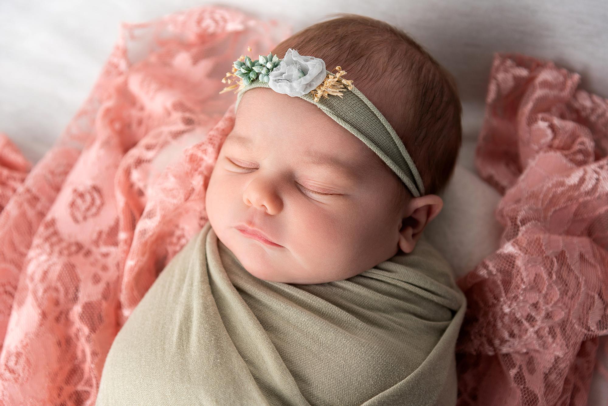 A sleeping newborn baby