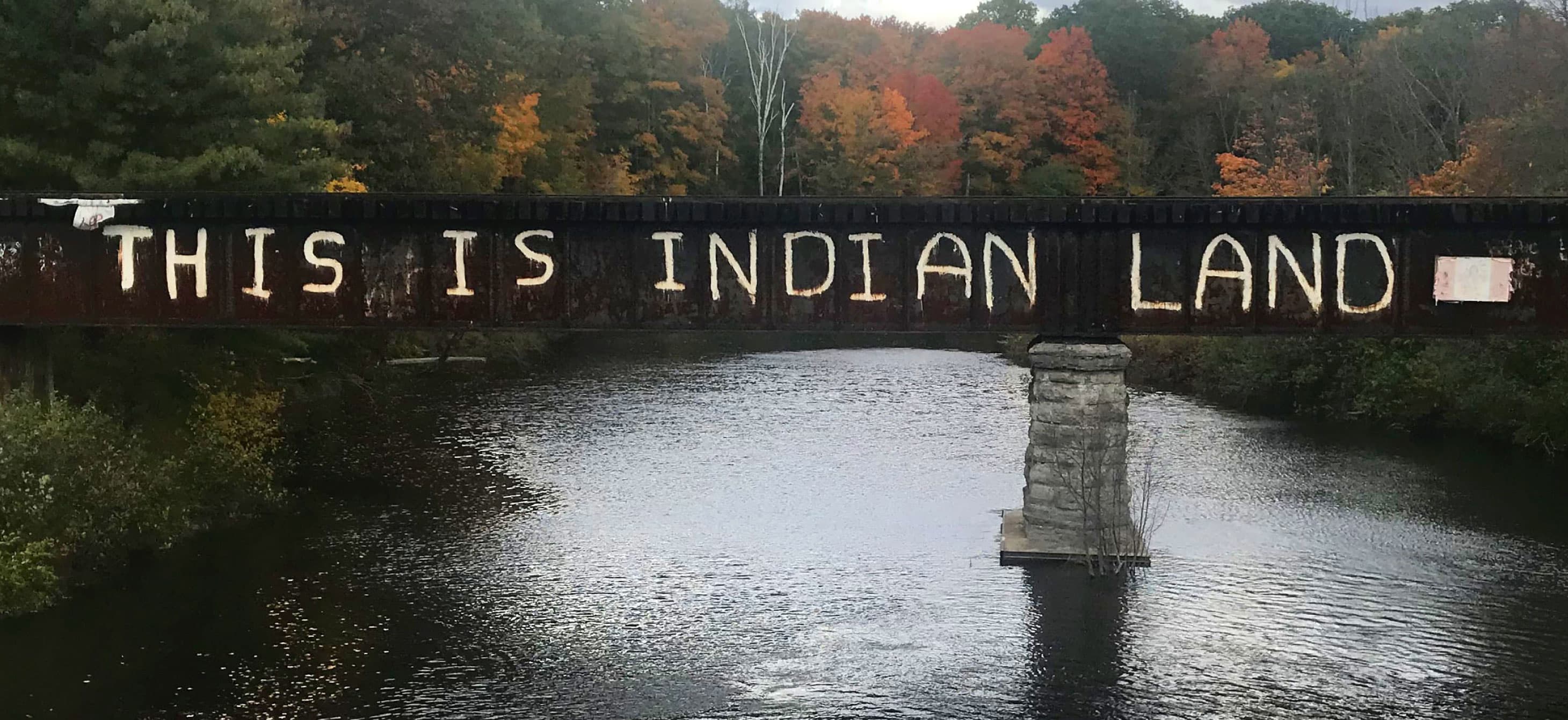 A bridge with this is Indian land graffiti