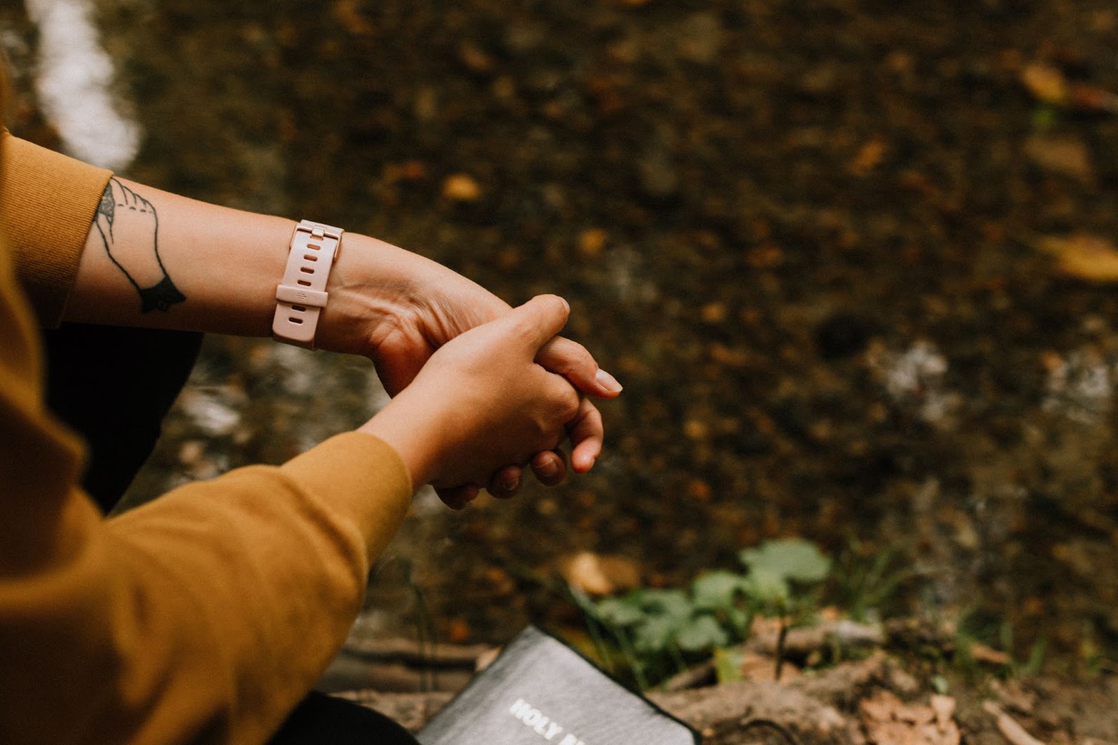 Hands clasped in prayer