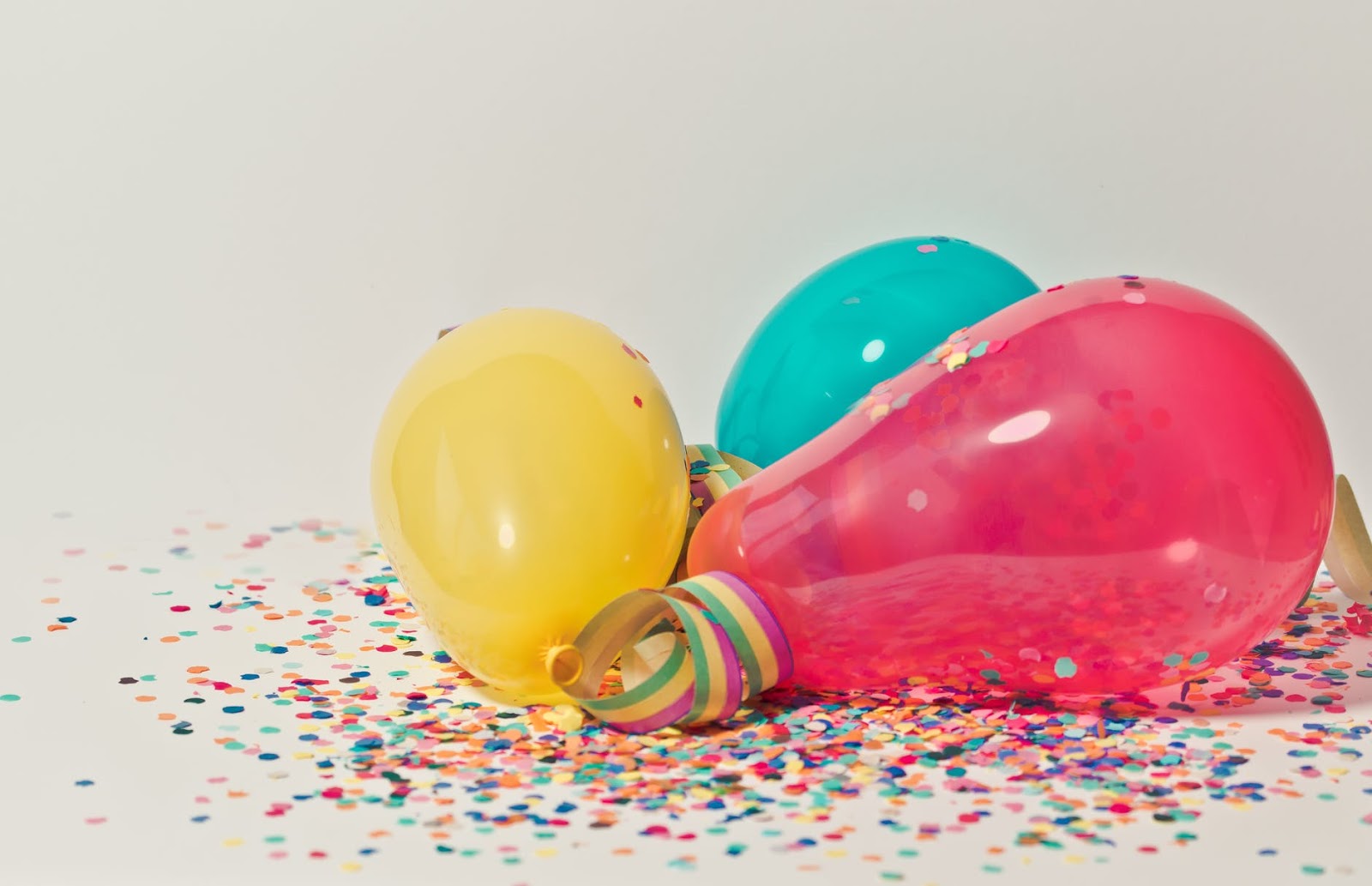 Balloons and confetti on the ground