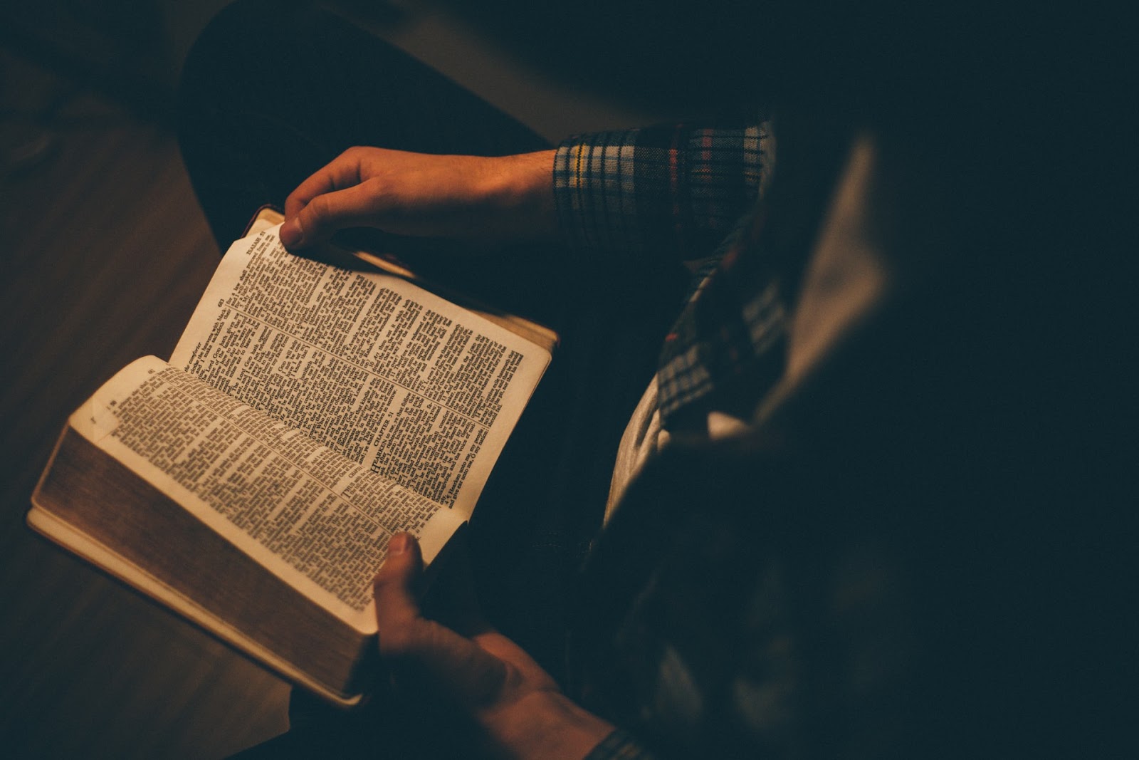 person reading a bible