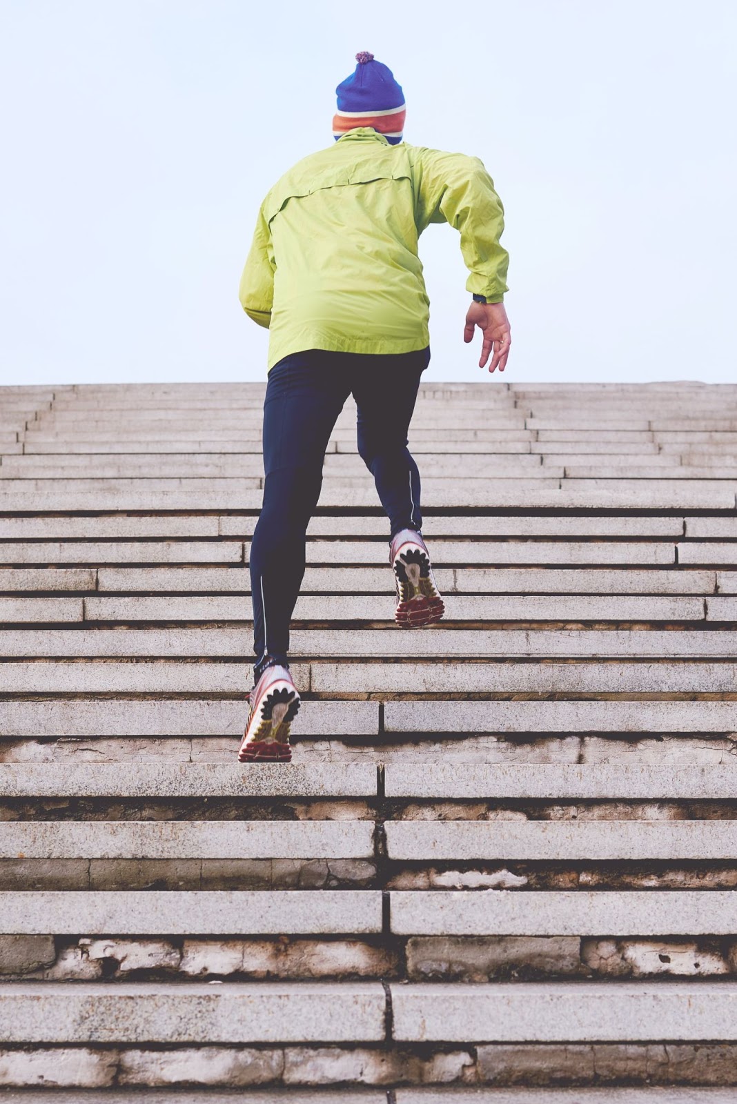 a person running up a set of stairs