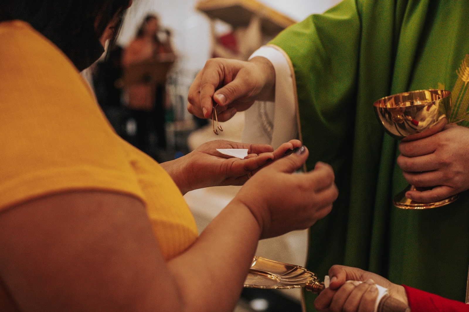 a person receiving holy communion