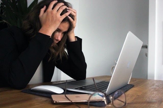 Businesswoman stressed at work