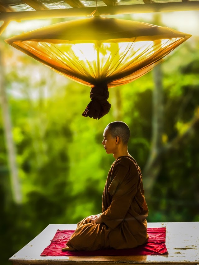 Buddhist monk meditating