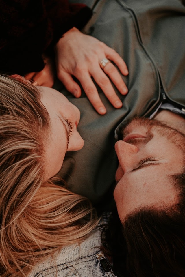Man and woman showing affection for one another
