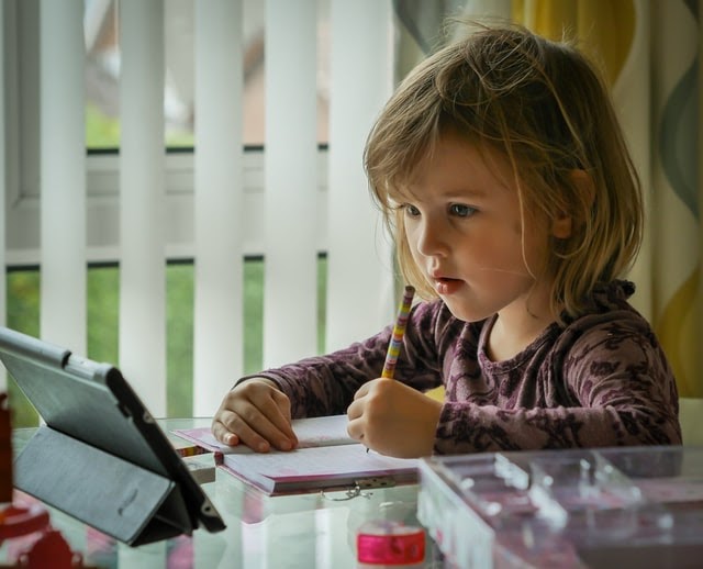 Elementary school girl learning from home